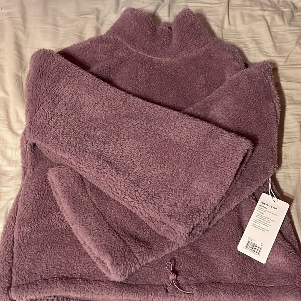 Very cute and cozy sweater!! Just not my style. Never worn just try on.